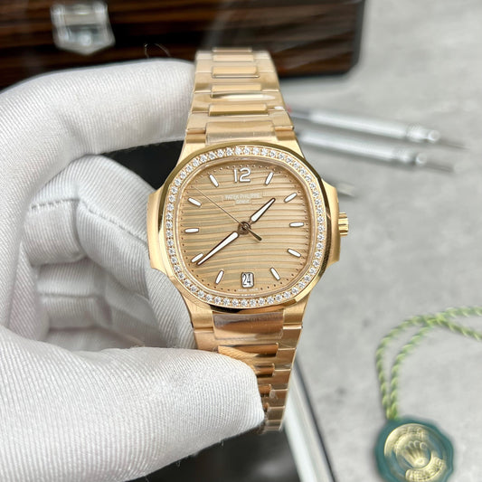 Patek Philippe Nautilus 7118/1R-010 18k gold filled from the 3k factory with yellow dial